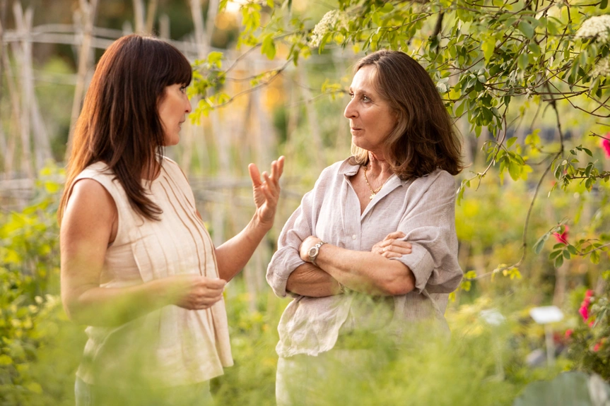 neighbours chatting in garden